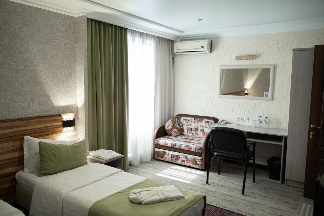 Uyutnyy Dom Hotel Taraz Exterior photo
